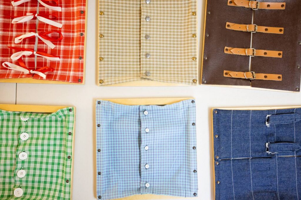 Montessori dressing frames used in Practical Life lessons during teacher training