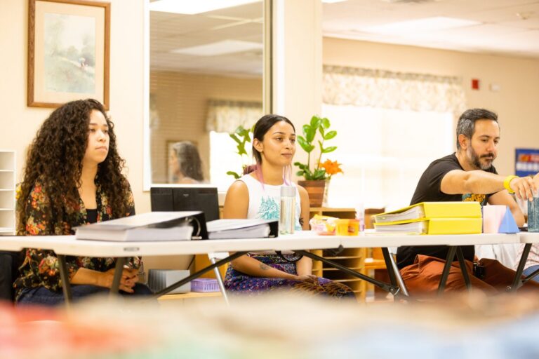 Small group of adult learners at a Montessori teacher training session in San Diego